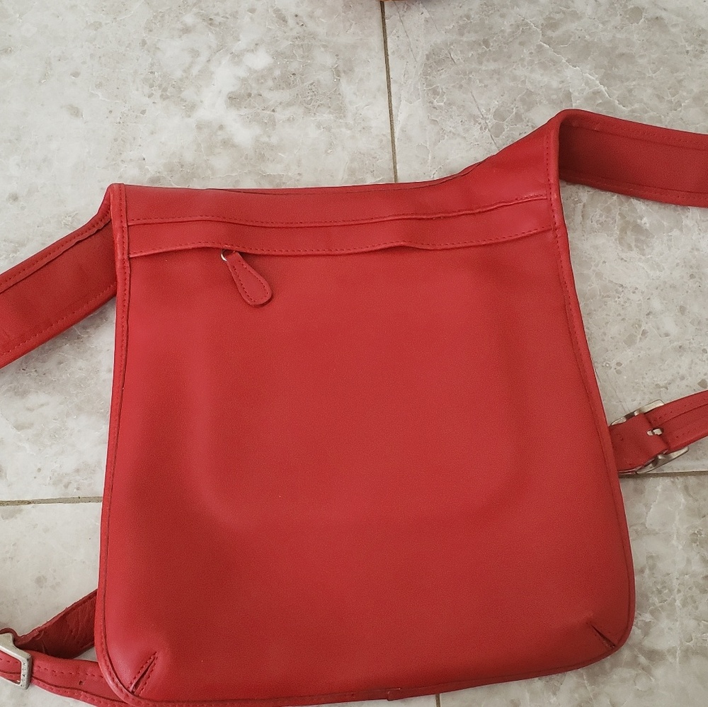 Like new small red leather Coach backpack